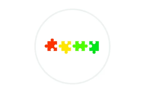Icon: Vier bunte Puzzleteile in Rot, Gelb und Grün im Kreis