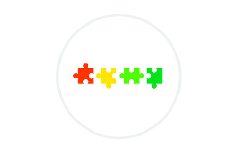 Icon: Vier bunte Puzzleteile in Rot, Gelb und Grün im Kreis
